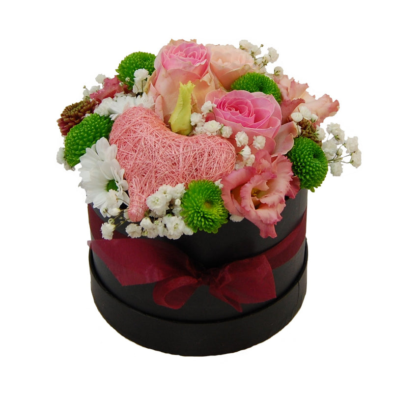 Flowerbox mit frischen Blumen in Farben Rosa mit Herz. Eine herzberührendes und außergewöhnliches Blumenarrangement, das keine zusätzliche Vase braucht.